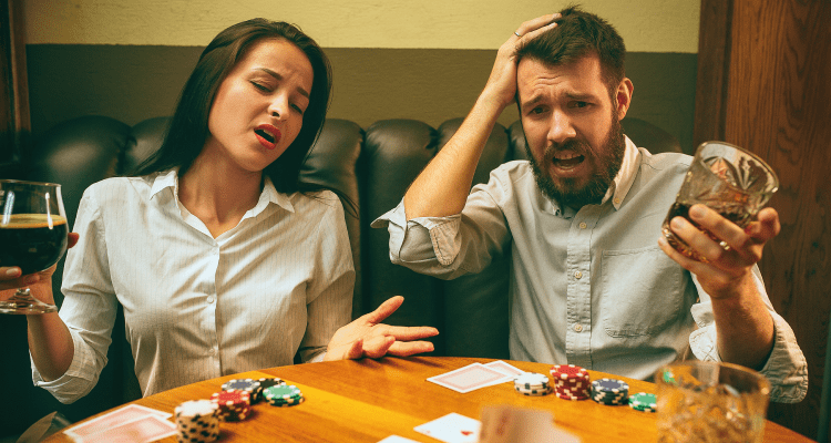 A man and a girl are upset after losing money in a gambling casino app